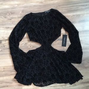 Black cut out dress with velvet detail